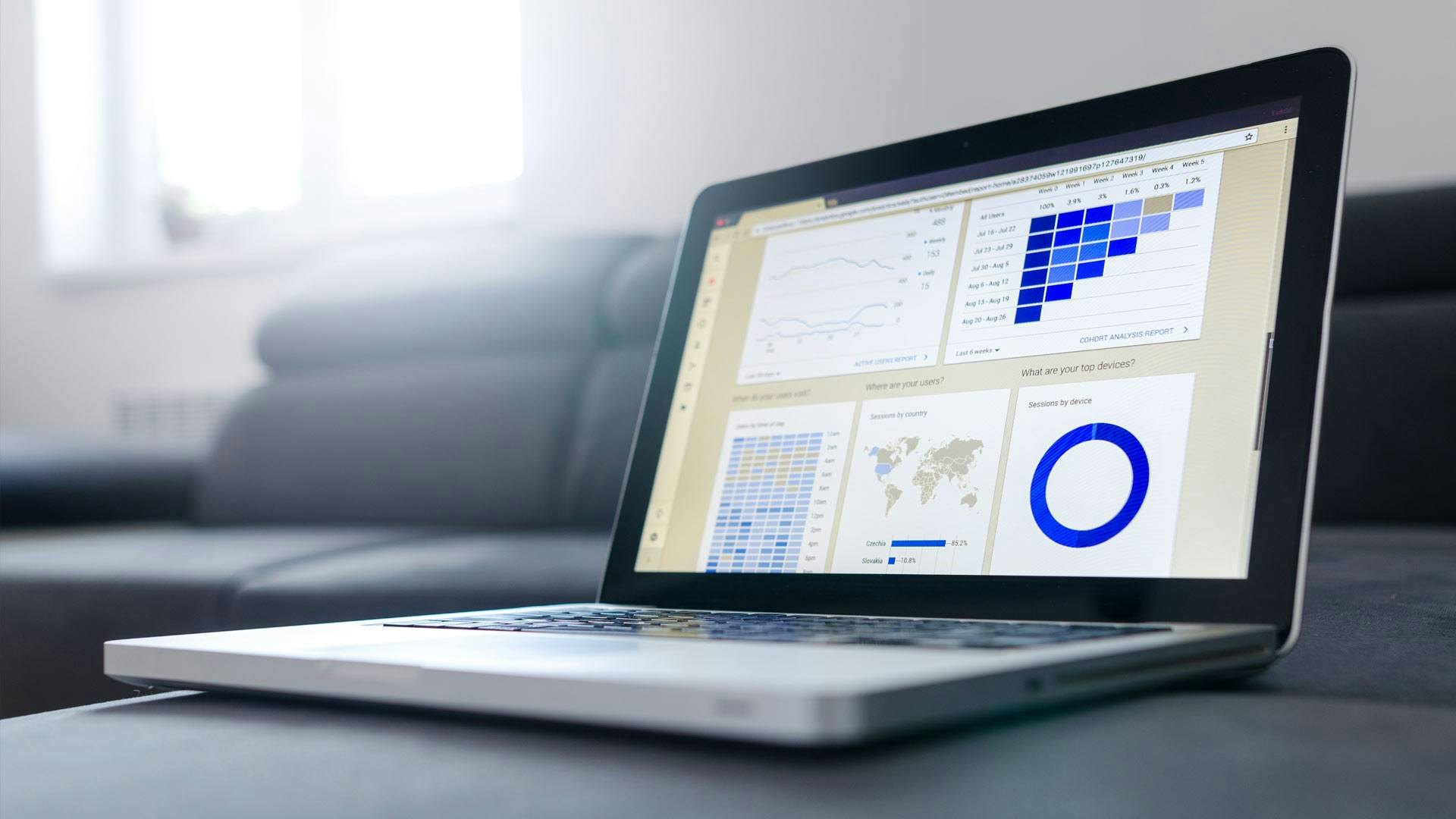 Laptop with Digital Marketing Metrics